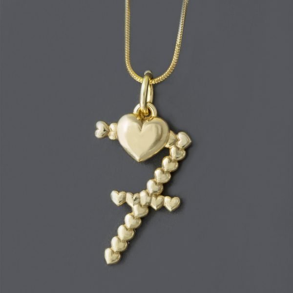 gold pendant lucky number seven on grey background