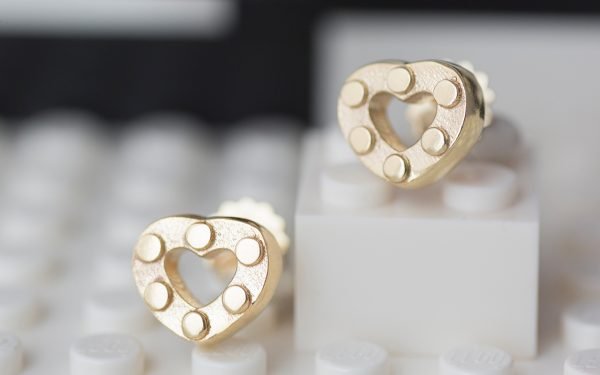 pair of gold heart earring with lego studs