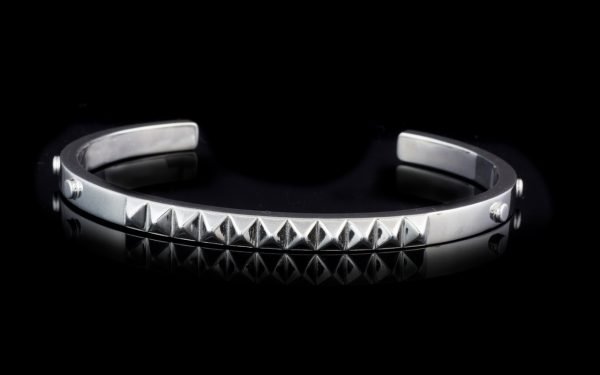 silver jewellery bangle with pyramids