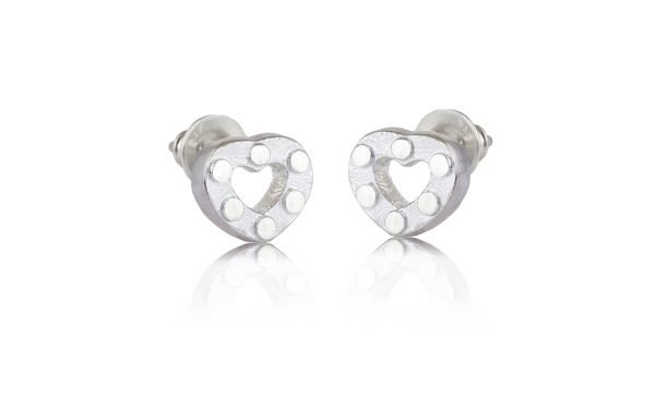 silver heart studded earrings on white background