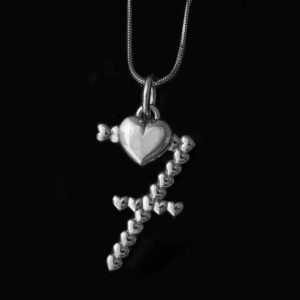 silver number seven pendant on silver chain